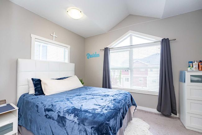 610 Redstone View Ne, Townhouse with 2 bedrooms, 3 bathrooms and 2 parking in Calgary AB | Image 25