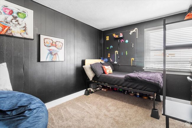 Bedroom featuring baseboards and carpet flooring | Image 35
