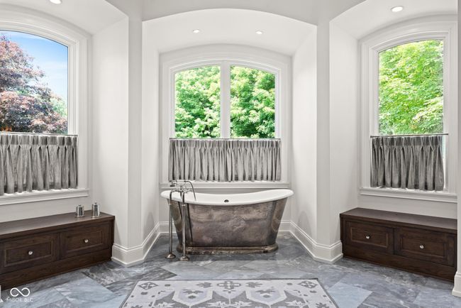 primary bathroom featuring a freestanding bath | Image 28