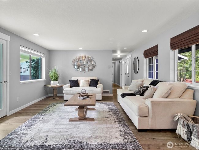 Updates include granite counters, newer stainless appliances, new LVP flooring, carpet, and paint. | Image 7