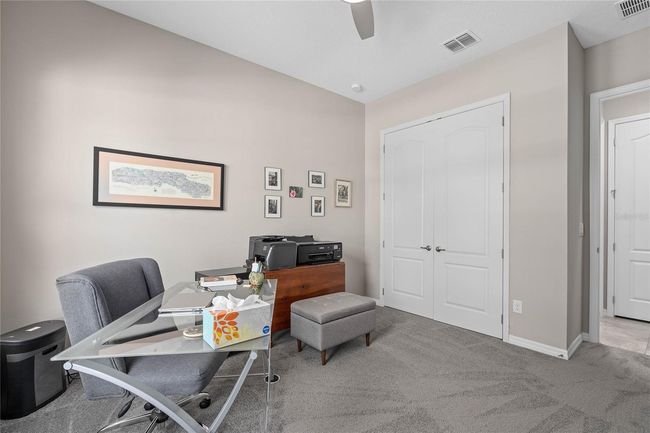 Bedroom 3 is being used as an office | Image 4