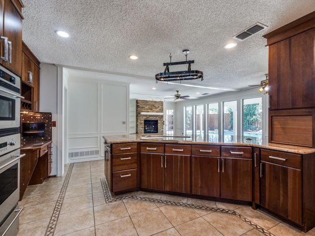 Open kitchen has so much storage! | Image 16