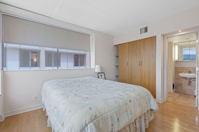 Blinds throughout the condo are remote controlled. | Image 14
