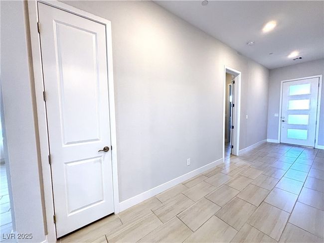 Spare room with baseboards | Image 21