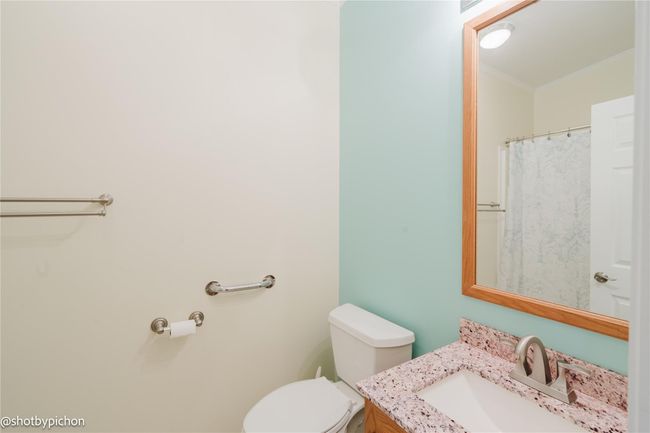 Full bath featuring crown molding and vanity | Image 10