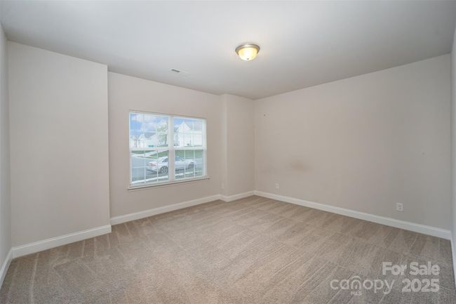Another view of the spacious Second Downstairs Bedroom with walk-in closet. | Image 24