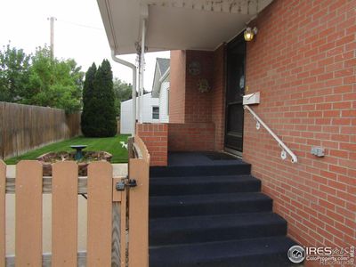 Entrance to home and patio area | Image 2