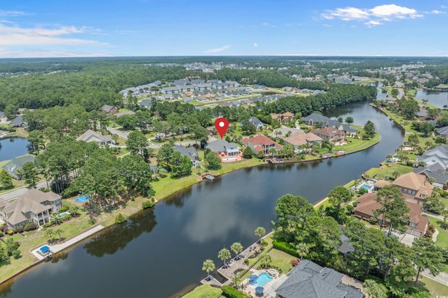 Aerial view of property and surrounding area with nearby suburban area and a large body of water | Image 4