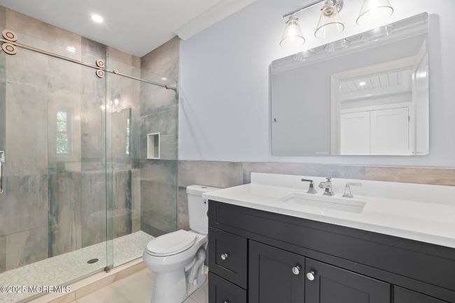 1st level full bathroom | Image 8