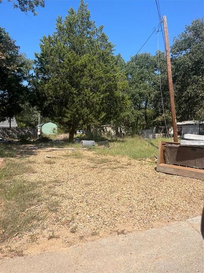 View of yard with a jacuzzi | Image 2