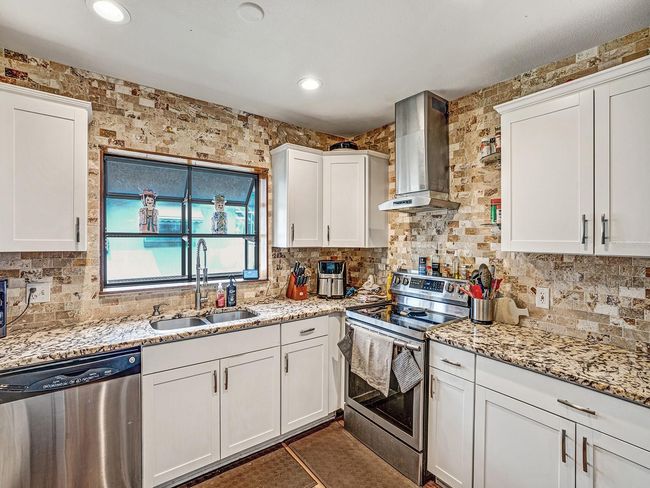2160 Ne Coachman Rd, House other with 3 bedrooms, 2 bathrooms and null parking in Clearwater FL | Image 10