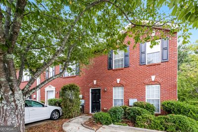 5797 Strathmoor Manor Circle, Townhouse with 3 bedrooms, 2 bathrooms and null parking in Lithonia GA | Image 1