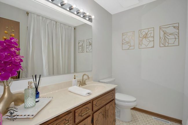 Second floor hall bath. Comfort height commode, up | Image 17