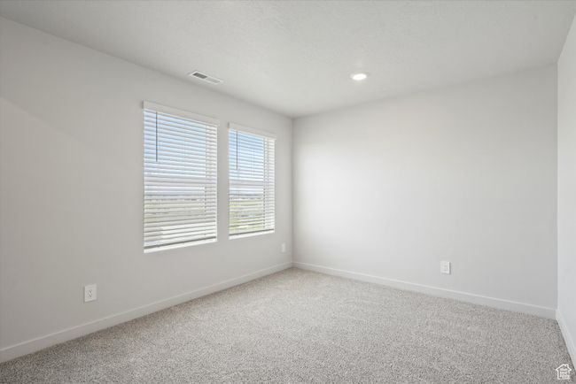 Carpeted spare room with baseboards and recessed lighting | Image 38