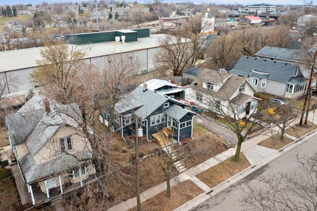 An aerial view of the home and its surrounding neighborhood. | Image 15
