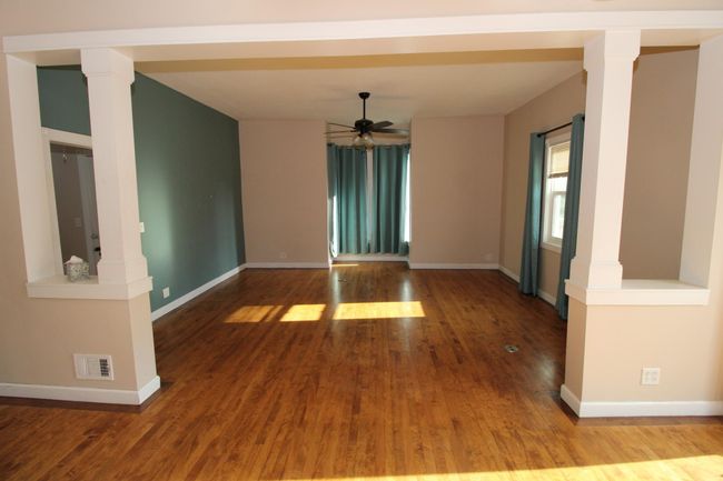 Looking from Dining area to Living area w/ceiling fan | Image 10