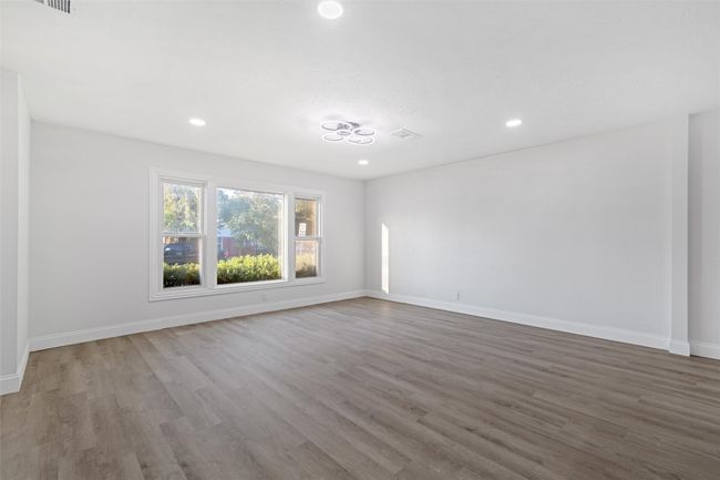Empty room with wood-type flooring | Image 16