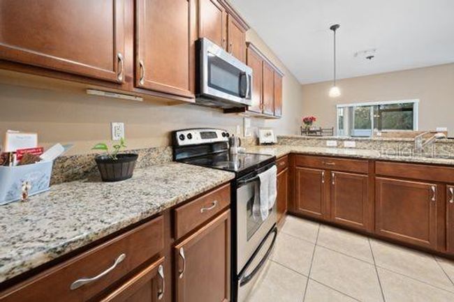 8609 Fiddleleaf Ct, Townhouse with 3 bedrooms, 3 bathrooms and null parking in TAMPA FL | Image 11