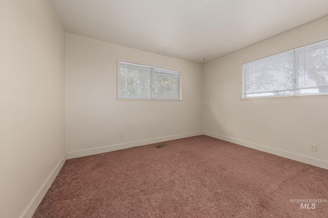 Spare room with light colored carpet and baseboards | Image 21