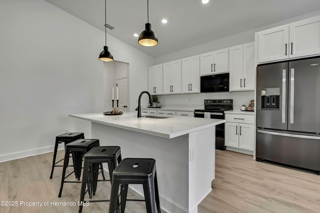 9739 Loretto St, House other with 4 bedrooms, 3 bathrooms and null parking in SPRING HILL FL | Image 10