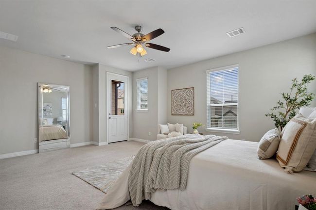 Luxurious primary bedroom. | Image 12