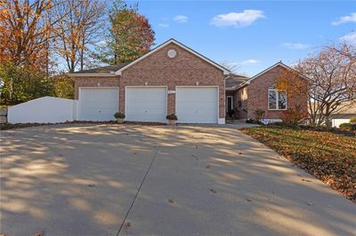 View of front of property with a garage | Image 2