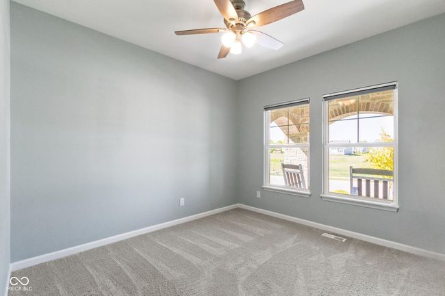 Main Level Bedroom, perfect for multi-generational living or guests. | Image 10