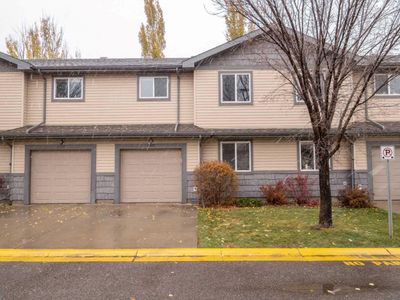 3 - 113 Silkstone Rd W, Home with 2 bedrooms, 2 bathrooms and 2 parking in Lethbridge AB | Image 1