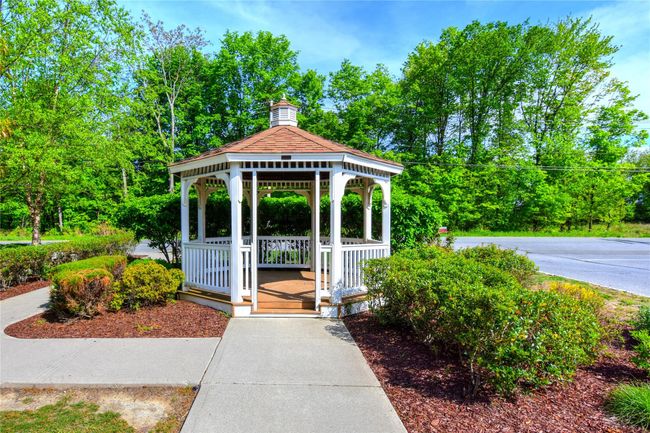 Surrounding community with a gazebo and view of scattered trees | Image 32
