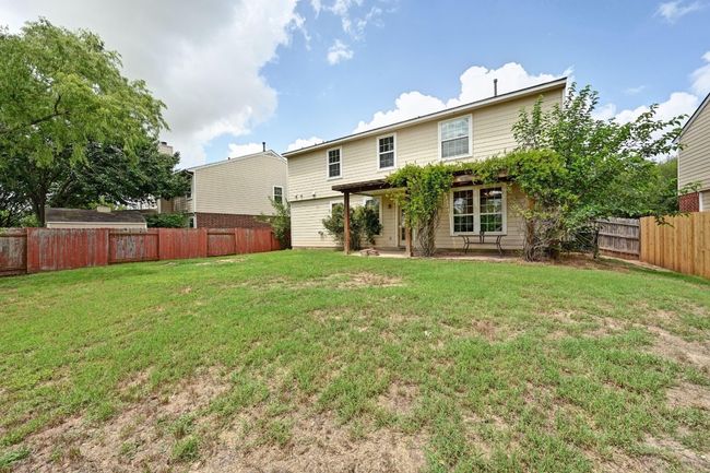 Back of property featuring a fenced backyard | Image 33