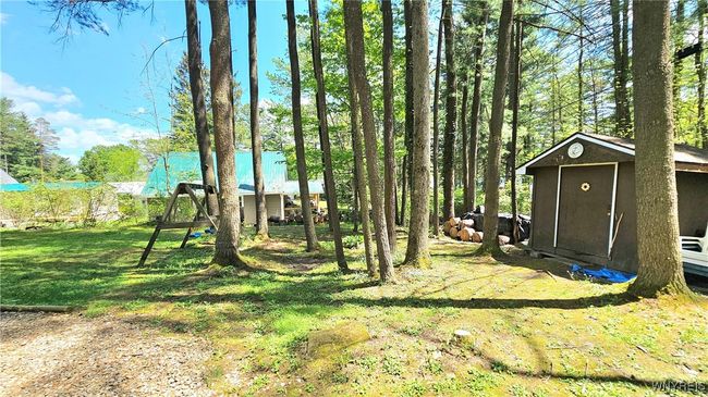 8121 Woodside Dr, House other with 2 bedrooms, 1 bathrooms and null parking in Caneadea NY | Image 39
