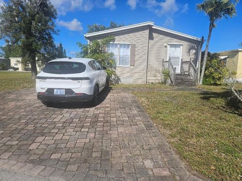 1277-4317 71st St N, Riviera Beach, FL, 33404-4825 | Card Image