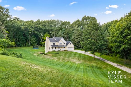 1873 Grand River Dr, Ada, MI, 49301-8766 | Card Image