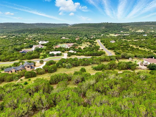 View of property location with a forest | Image 6