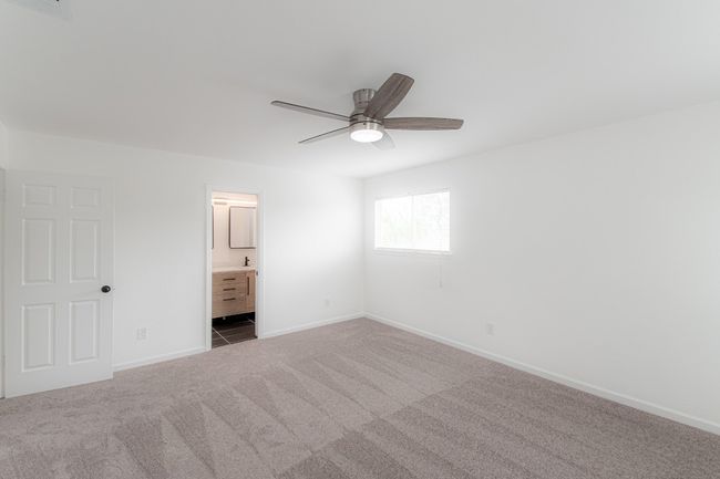 The primary retreat features tons of natural light. | Image 22