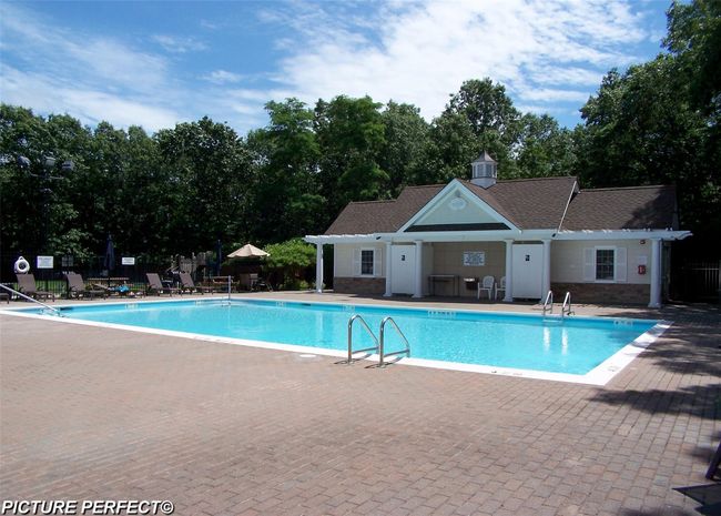 View of pool featuring a patio | Image 13