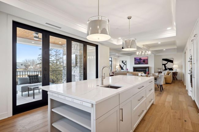 Custom cabinets throughout the kitchen provide for additional storage space | Image 14