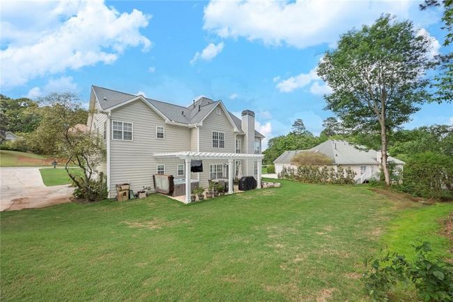 225 Ruby Forest Pkwy, House other with 4 bedrooms, 3 bathrooms and 5 parking in Suwanee GA | Image 39