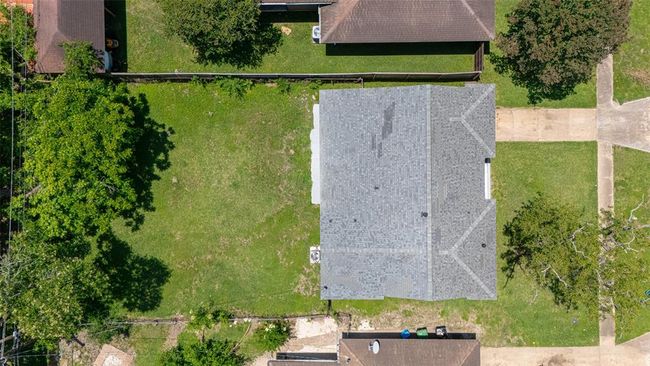 A flat aerial highlights the overall lot dimensions and proportions, giving a full picture of the space available. | Image 39