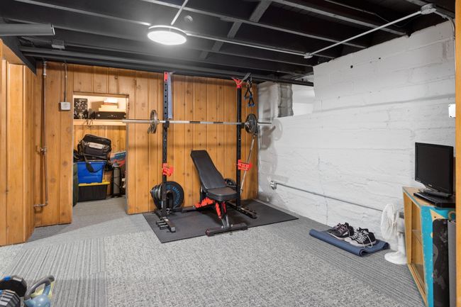 Lower level exercise room to get that beach body ready! | Image 13