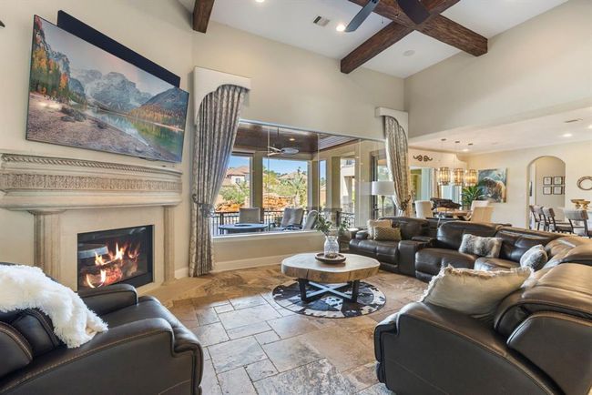 Cozy Family Room with Elegant Gas Fireplace | Image 10