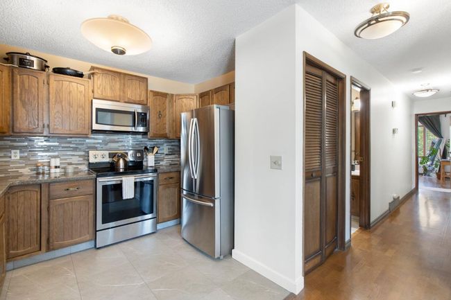 64 Cedarbrook Way Sw, Home with 4 bedrooms, 3 bathrooms and 2 parking in Calgary AB | Image 8