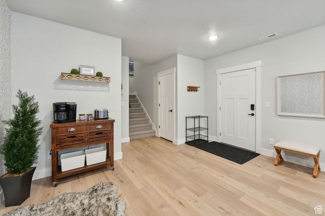 Entry to downstairs living room area | Image 31