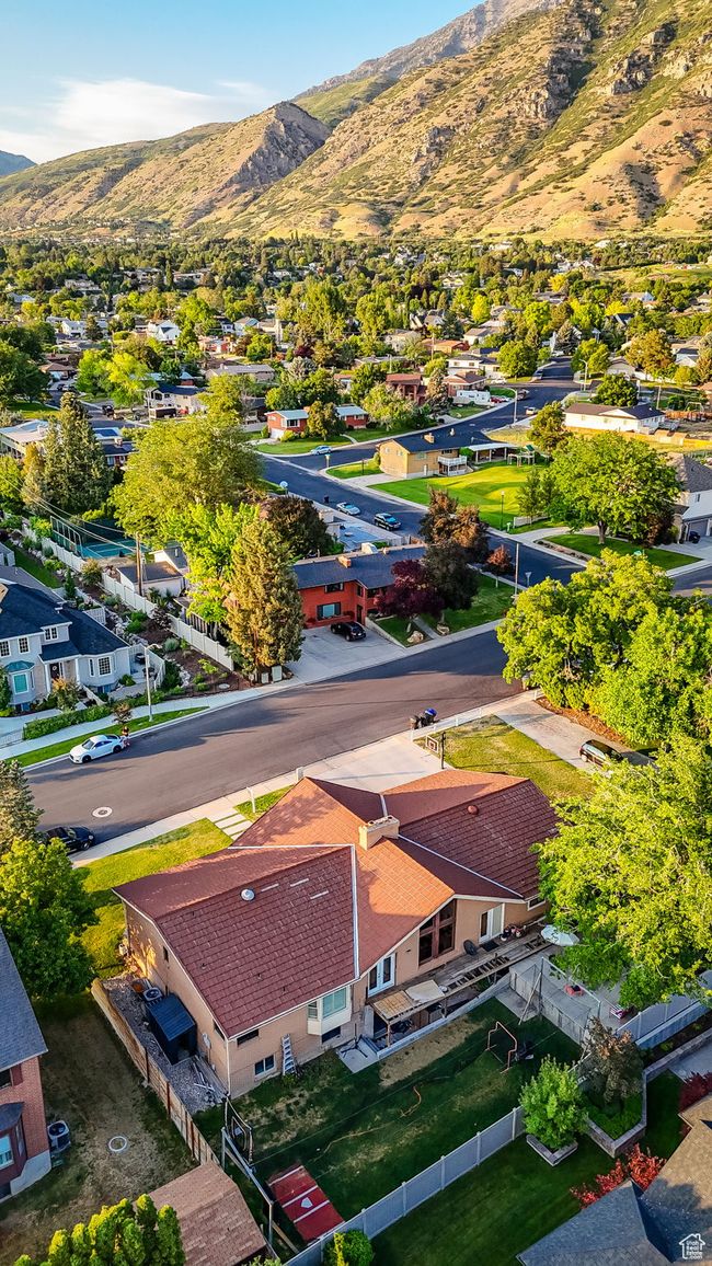 Aerial perspective of suburban area with a mountainous background | Image 42