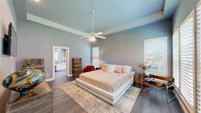 Primary Bedroom features tray ceiling | Image 19