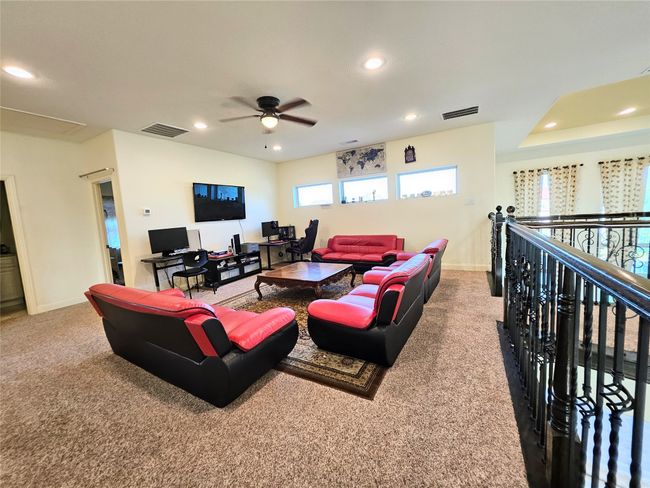 Living room featuring recessed lighting, carpet, a ceiling fan, and baseboards | Image 29