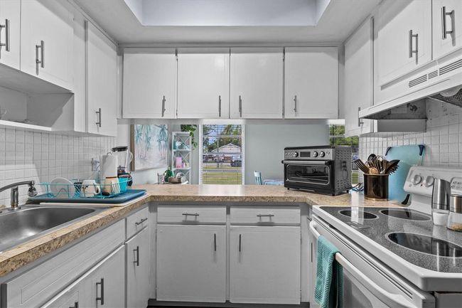 15629 Waverly St, Home with 4 bedrooms, 2 bathrooms and null parking in CLEARWATER FL | Image 11