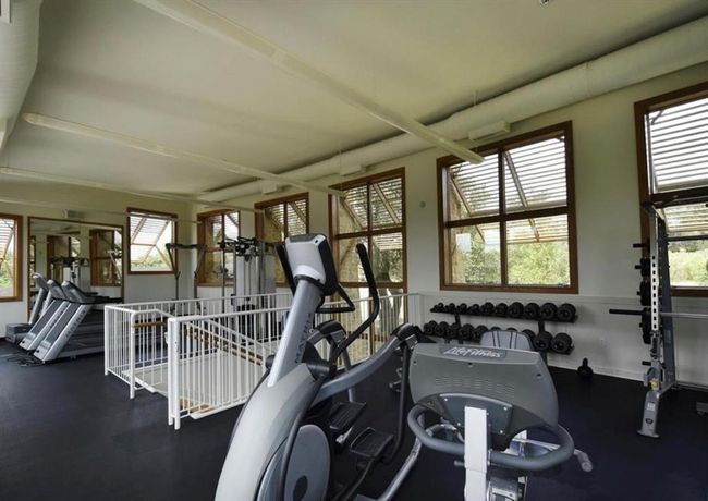 Workout area with healthy amount of natural light | Image 37