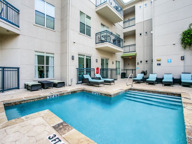 Community pool featuring a patio area and outdoor lounge area | Image 11