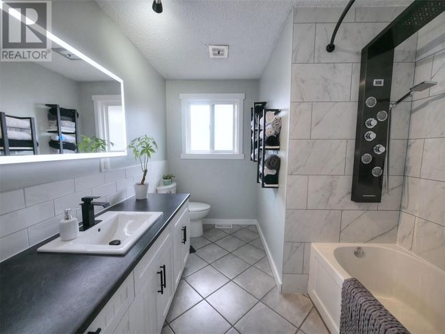 21 Duncan Ave, House other with 6 bedrooms, 4 bathrooms and 6 parking in Fruitvale BC | Image 5